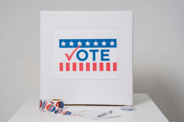 Ballot box with "I voted" stickers